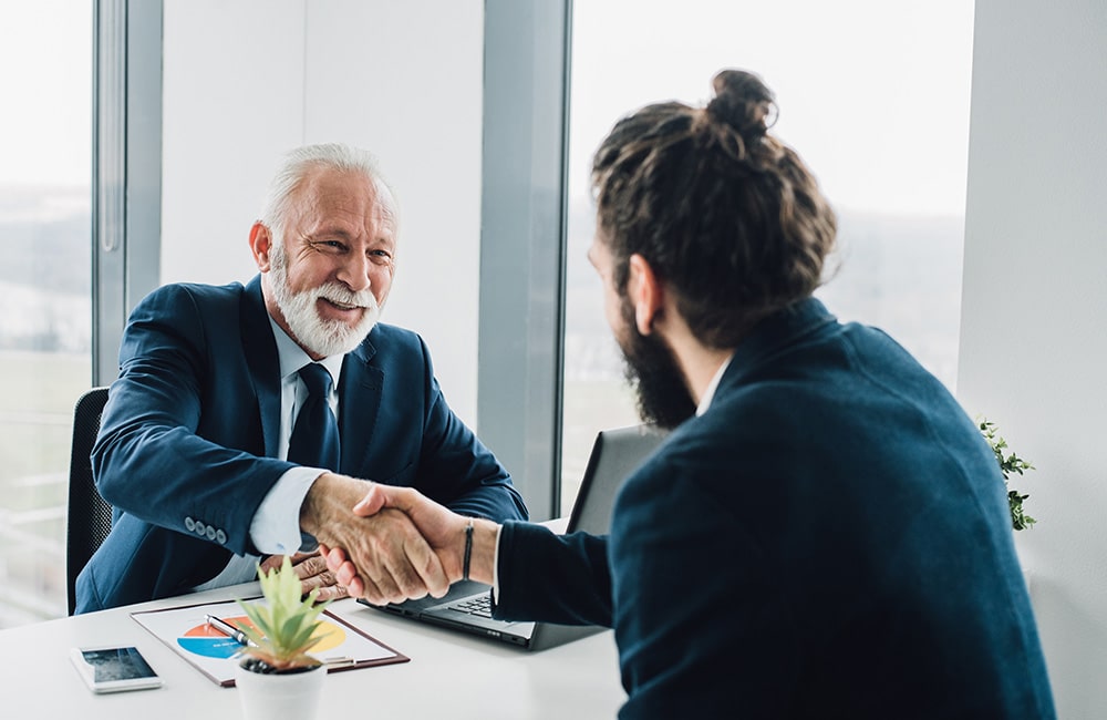 lawyer meeting with clients in their office