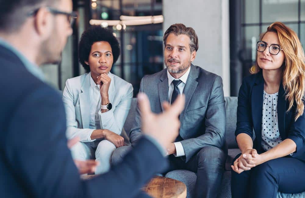 Lawyers gathering in an office for a meeting